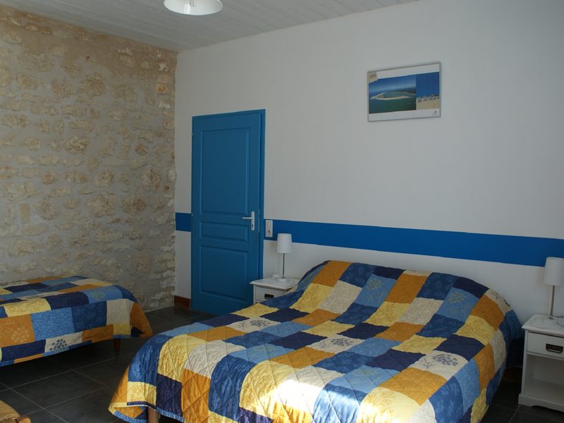 Blue room 1 double bed and 1 single bed